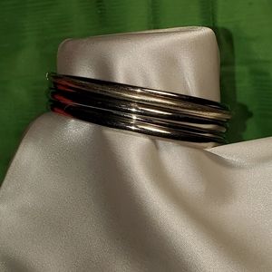 6 Silver tone bangles